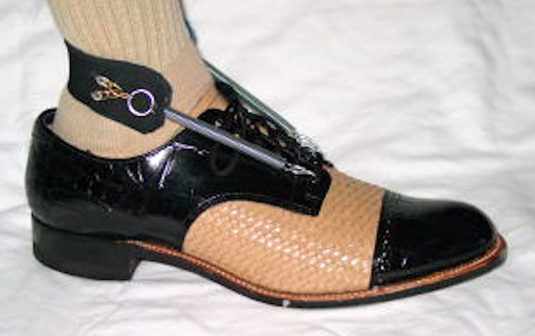 Chris wearing Freedom Walk AFO Free Flex Drop Foot Brace with a black and beige dress shoe