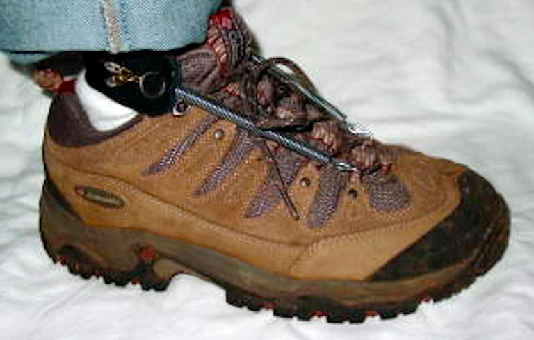 Freedom Walk AFO Free Flex original spring model drop foot brace on brown hiking shoe