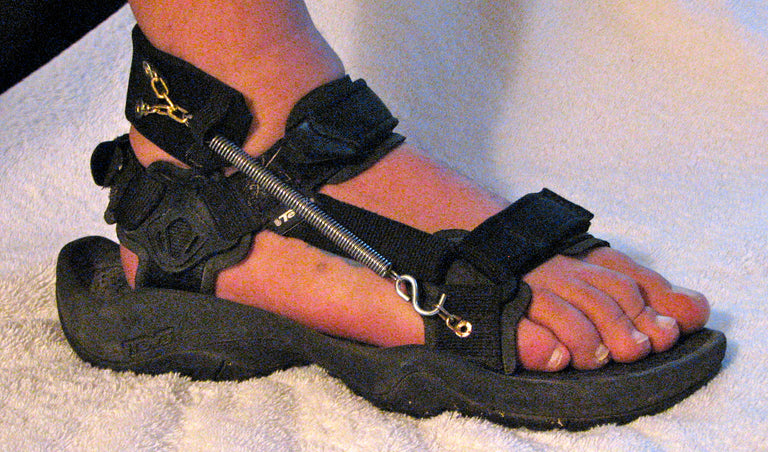 Freedom Walk AFO Free Flex original spring model drop foot brace on black sandal